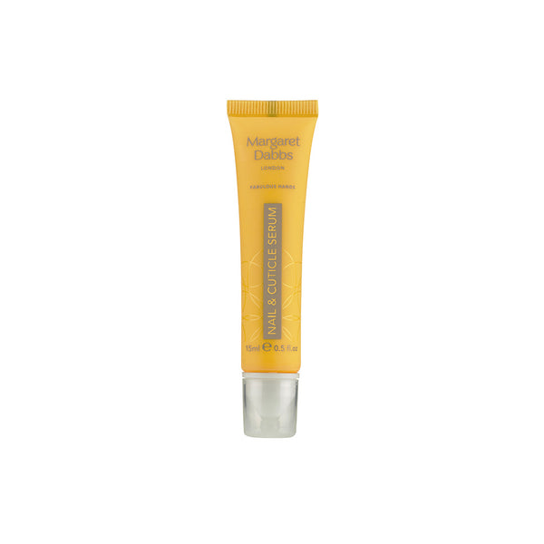 Yellow tube of nail cuticle serum with silver base on a white background