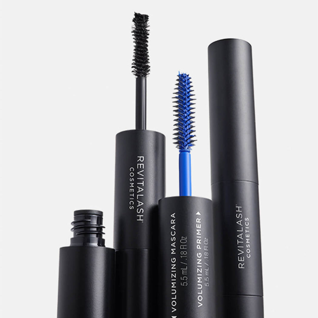 Revitalash cosmetic products including mascara and primer on a white background