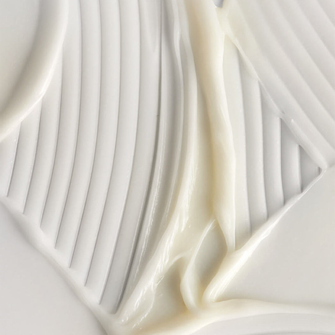 Close-up of white fabric with a textured pattern