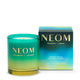 NEOM candle and packaging on a white background