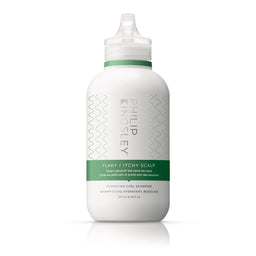 White shampoo bottle with green label on a white background
