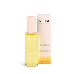 NEOM Pro-Vitamin D3 Dry Body Oil with packaging on a white background