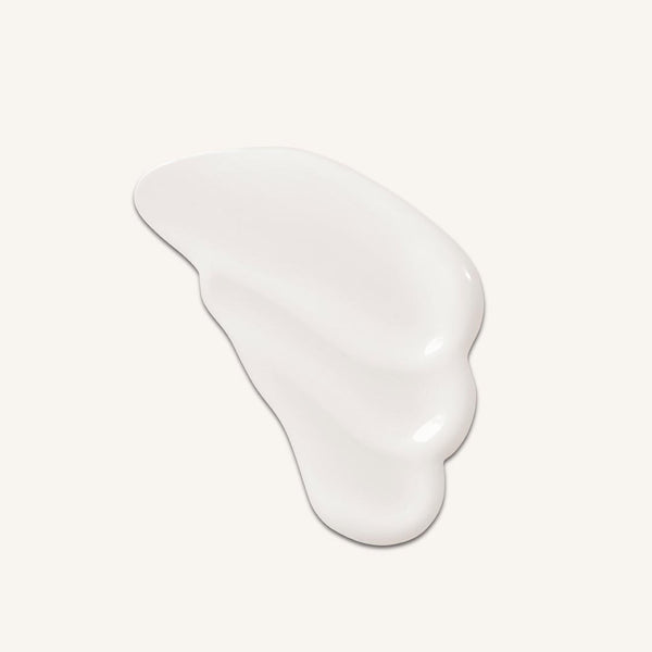 White, wavy ceramic plate on a light gray background