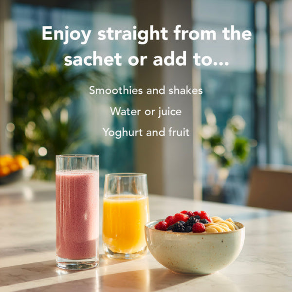 A breakfast scene with two glasses of drink and a bowl of fruit on a countertop, overlaid with the text 'Enjoy straight from the sachet or add to.