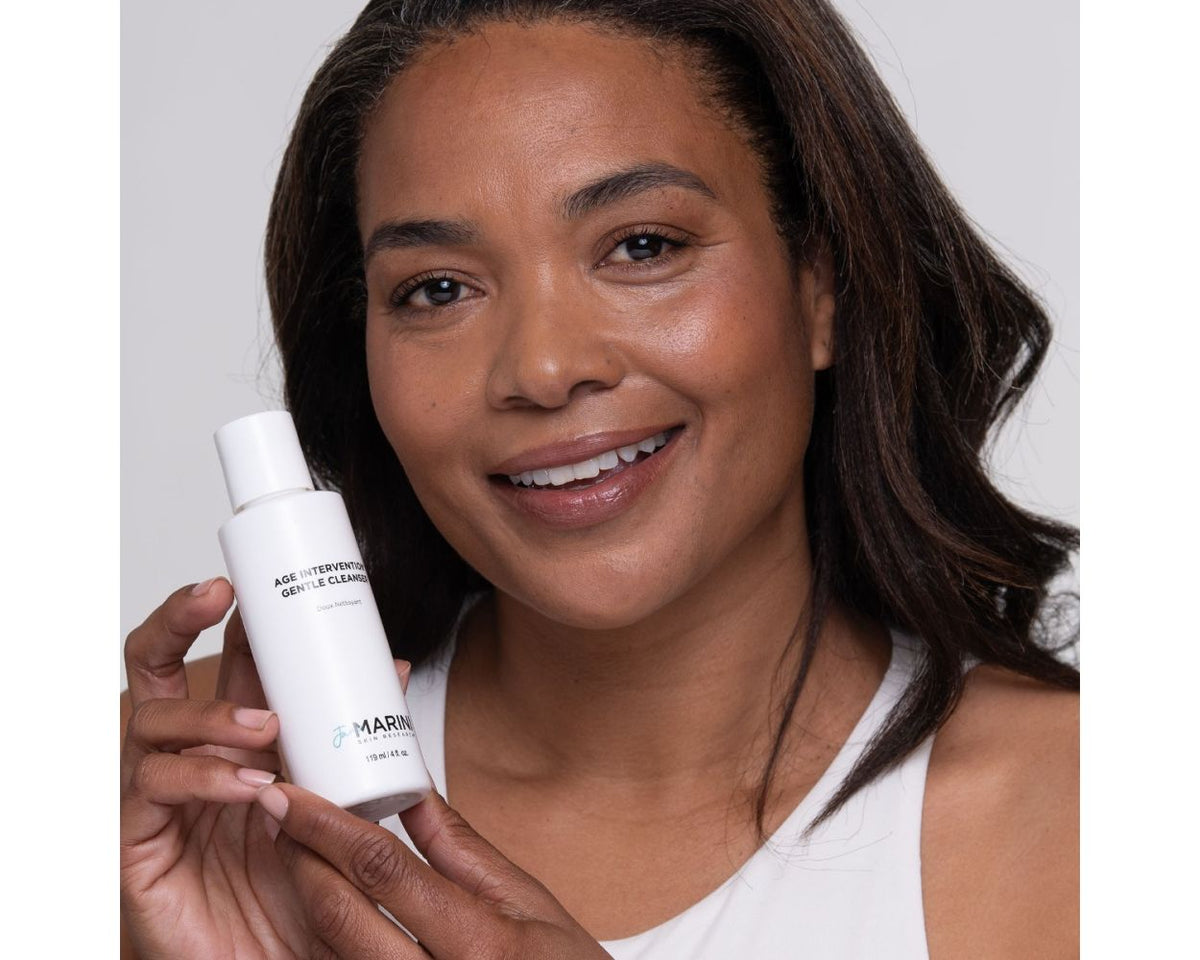 model holding the bottle close to her face