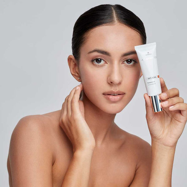 model holding ALLSKIN MED C Radiance Gel