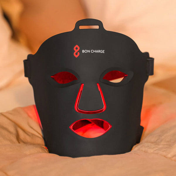 Red Light Face Mask On Bed