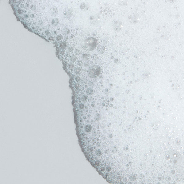 Foamy boundary on a light gray background