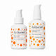 Two white pump bottles with orange polka dots from Cultured Biomecare on a clean white background. The left bottle is labeled 'Biomass One Mask' and the right bottle is labeled 'Vitality Cleansing Milk'.