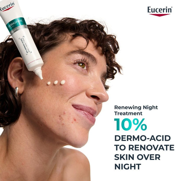 Eucerin Renewing Night Treatment with a woman applying it to her face.