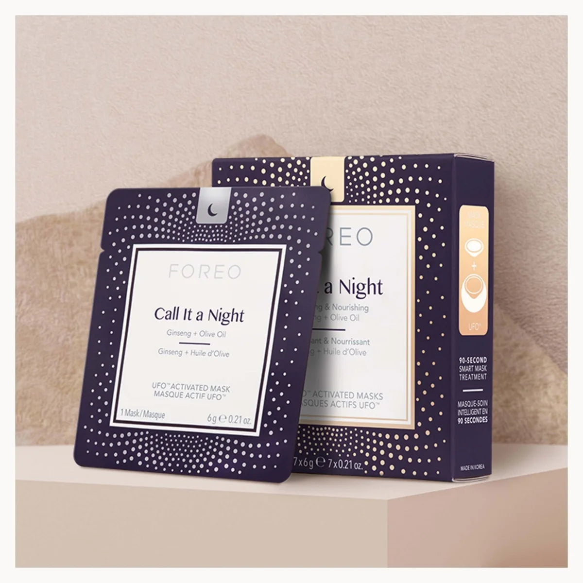 FOREO Call It a Night overnight mask packaging, showing a single sachet and its outer box in a dark purple color with white polka dots and cream-colored labels.