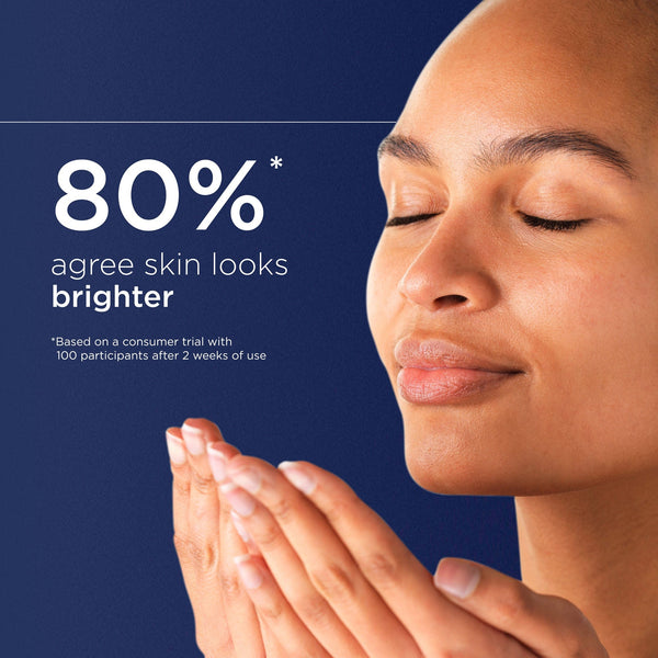 Woman with closed eyes and hands together against a blue background with skincare product text.