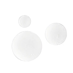 Three white circular objects on a black background