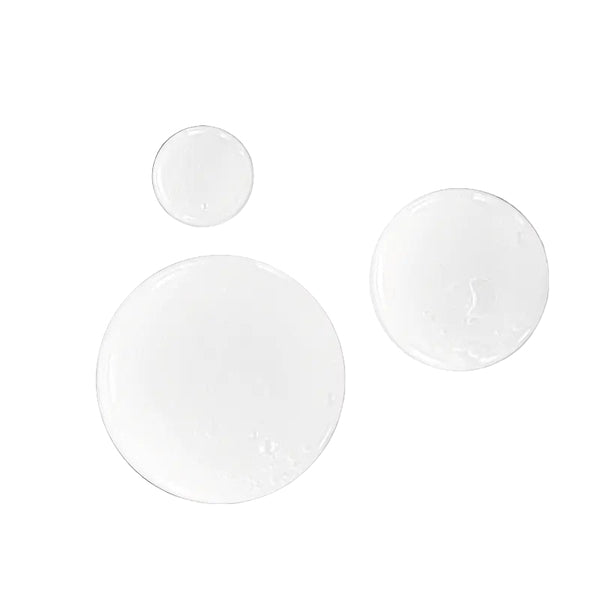 Three white circular objects on a black background