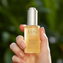 ESPA Optimal Skin ProSerum held in the air 