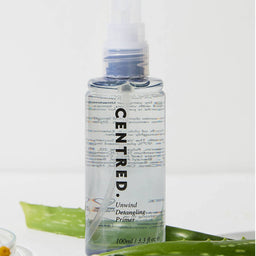 a closeup of the primer bottle with aloe vera at its base