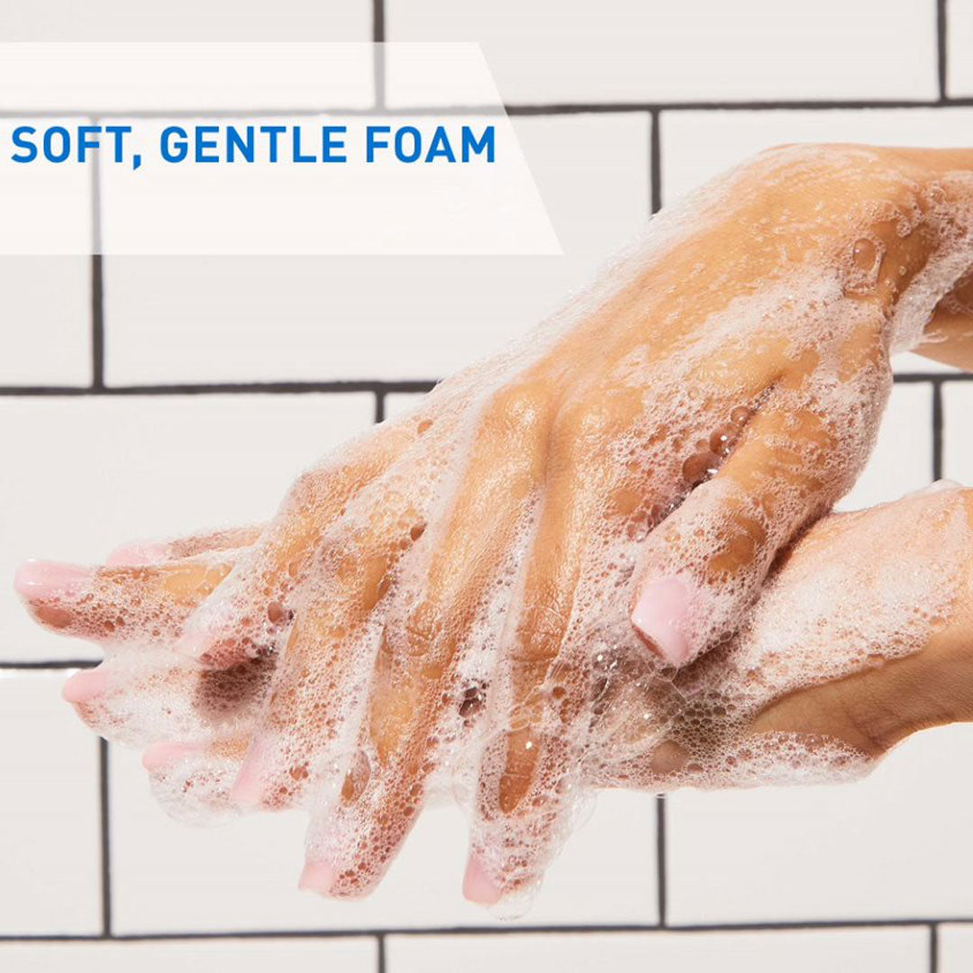 Model using CeraVe Hydrating Foaming Oil Cleanser 236ml on their hands. TEXT: Soft and gentle foam