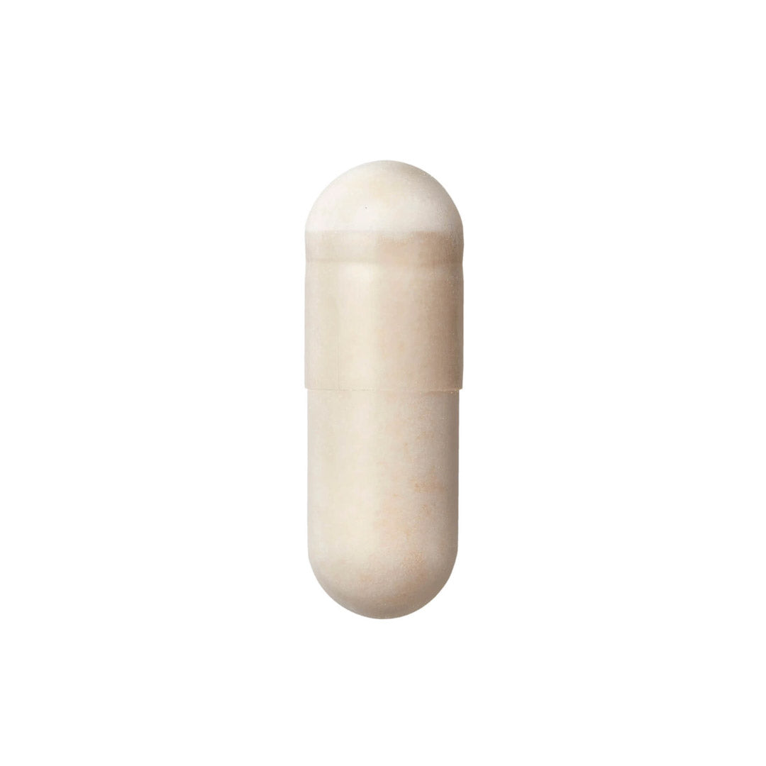 A closeup of a single capsule