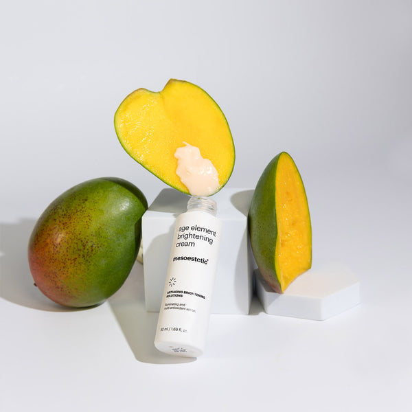 The contents of mesoestetic Age Element Brightening Cream poured onto a melon